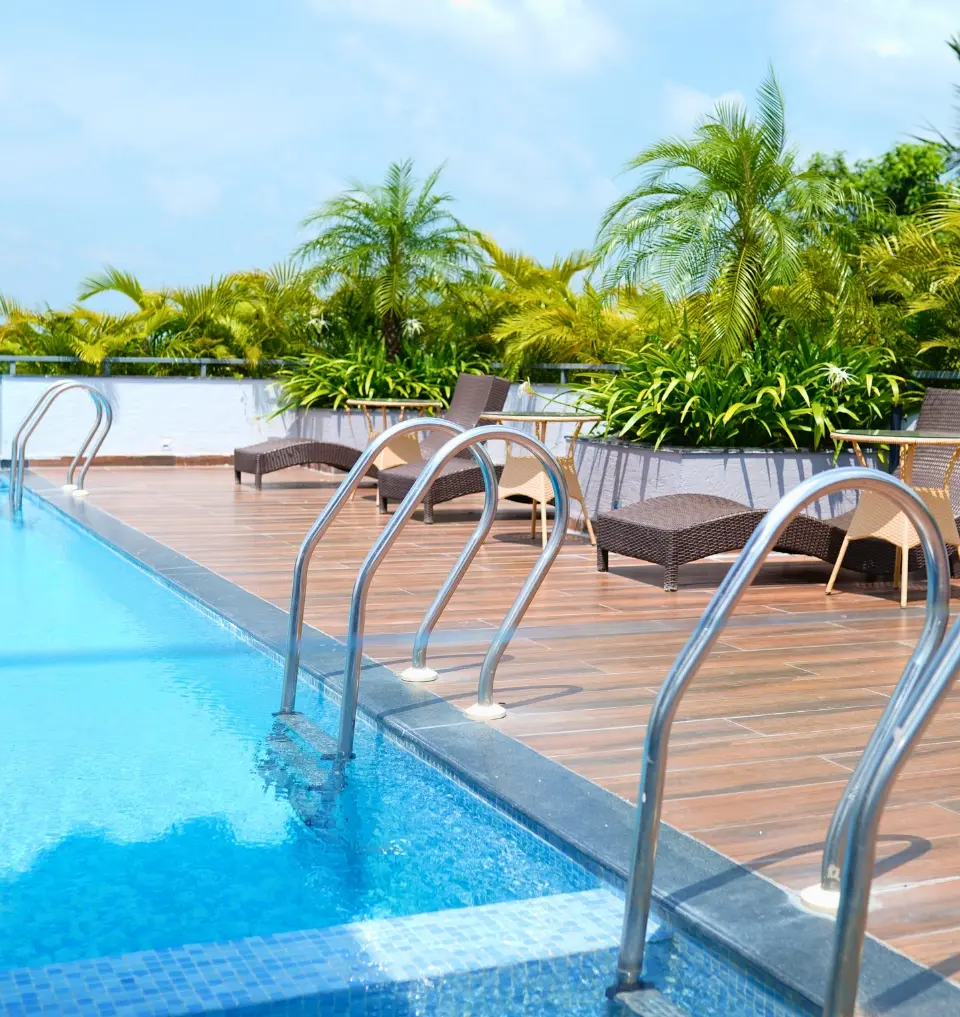 Outdoor pool with ample space for swimming and sunbathing.