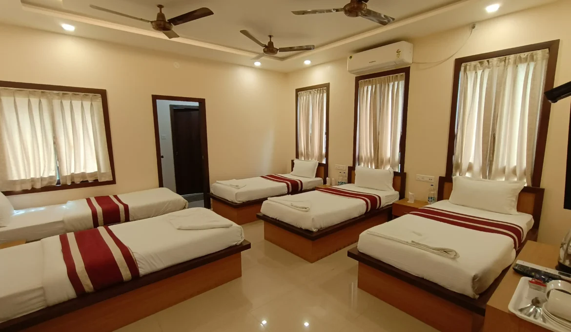 Spacious Family room with multiple beds, ideal for families or groups.